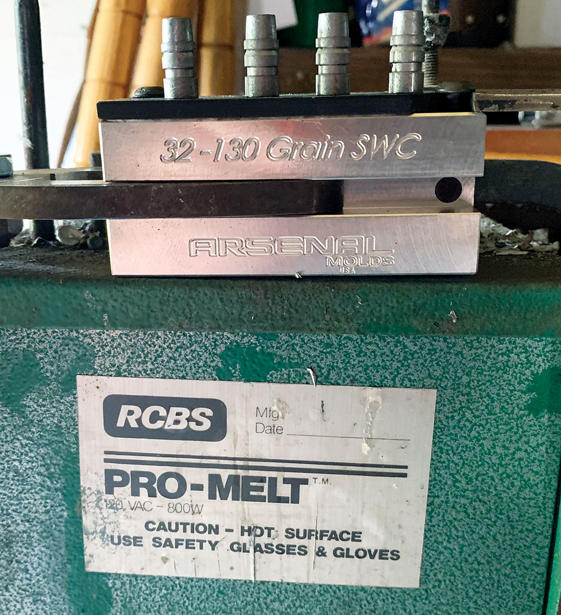 Tank’s new Arsenal Mould .32-caliber four-cavity aluminum mould posing on the casting pot.
